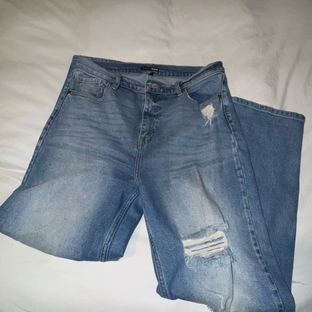 Distressed Blue Denim Jeans